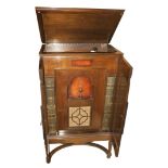 An Edison Radio Phonograph Combination, Model C-2, No. JC 1520, in walnut cabinet with tapering