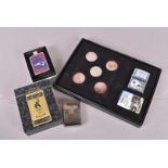 Sporting, a 2005 Super Bowl Champions 'The Cowboy' Zippo lighter and coin set, together with a