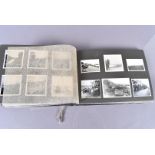 A War period German photograph album, containing 100+ black and white images, of uniformed Officer's