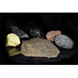 An assortment of World Rocks and Minerals, including Aragonite, Sulphur, Obsidian, Stromboli, Cone