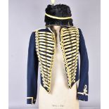 A Hussar's Uniform, the small blue jacket with applied yellow/gold rope design, with partical