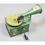 A child's tinplate gramophone, Genola, USA, of unusual design in green shaped rectangular case