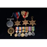 A WWII medal group, comprising War, Italy Star, Africa Star, and 1939-45 Star, complete with