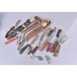 An extensive assortment of knives, to include, penknives, key rings, hunting knives, pocket knives