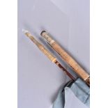 An Allcocks hexagonal split cane rod, the two piece rod being 8' in length, together with a Silver