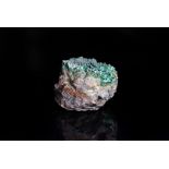 Malachite Chrysocolla, in rough form, with the Malachite forming in small balls to the top of the