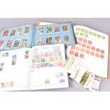 A collection of Stamps and Cigarette/trade cards, comprising of British and Overseas stamps, in
