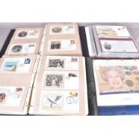 A vast collection of British FDCs and stamps, including a quantity of commemorative coin covers,