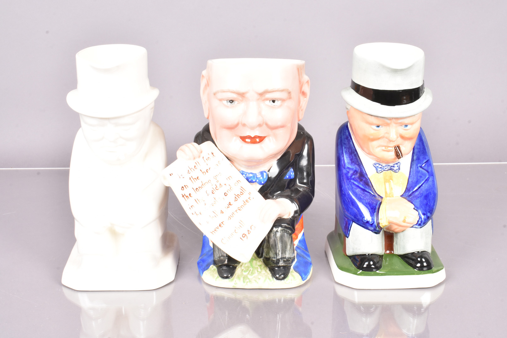 A Beswick Winston Churchill Toby jug, 931, AF, together with two Copeland Spode Churchill Toby jugs,