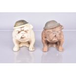 Two WWII period British pottery Bulldog figures, both with British Brodie helmet with 'Hitler's