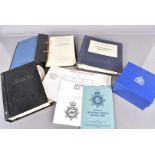 An assortment of 1970s/1980s Metropolitan Police uniform items, to include Traffic Police Hi-Viz