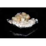 Stilbite and Apophyllite, a collection of various generations, with different formations, all