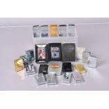 An assortment of Zippo lighters, various ages and designs, including a Vietnam example, used and