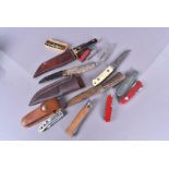 An assortment of various knives, to include hunting, penknives, Bowie style knives, a 1964 GPO and
