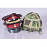 Two Medical Corps peak caps, including an Officer's example, together with a British Mk6 helmet,