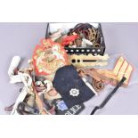 An assortment of items, to include button cleaning boards, sword hangers, cloth badges, buttons,