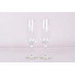 A case pair of drinking glasses, with the engraved initials AF possibly reproduction, please form