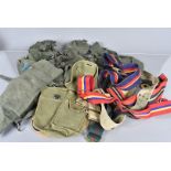 A large quantity of 1970s and later canvas pouches and webbing, various ages and sizes, together