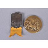A London 1948 Olympics Participation medal, together with a London 1948 Olympic Judges badge,