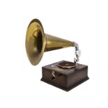A reproduction gramophone with brass horn