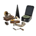 Gramophone novelties, comprising a Pigmyphone in suitcase style case, a conical phonograph horn,