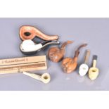 Churchill Smoking pipes, a small collection of smoking pipes, to include a cased Servi-Meerschaum, a