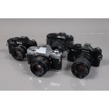 Four SLR Cameras, a Ricoh XR 500 Auto, shutter working, meter responsive, body G-VG, light wear,