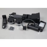 Canon Accessories, comprising a Speedlite 577G hammer head flash, a Sensor Unit G20, an Extender