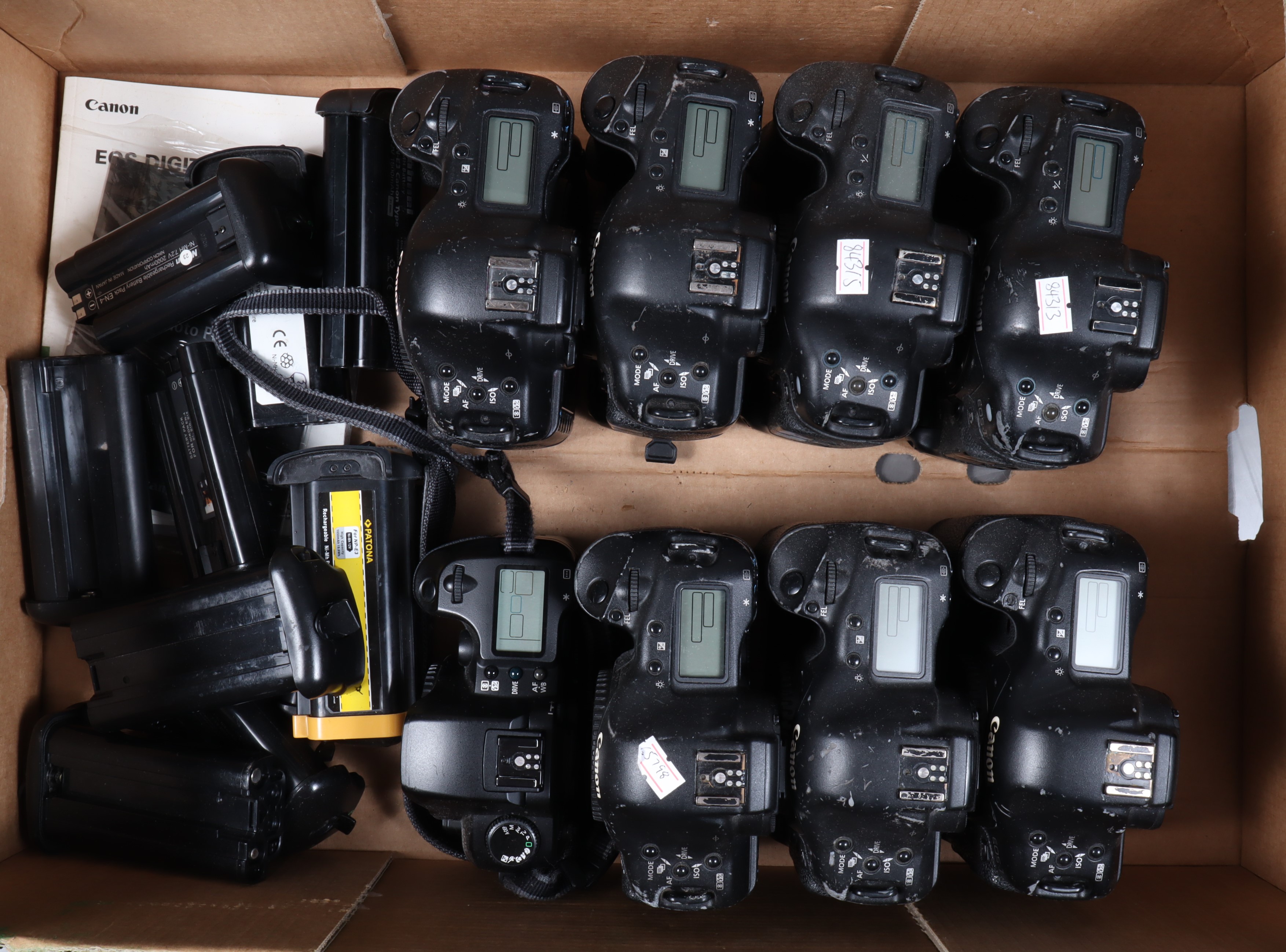 A Tray of Canon EOS DSLR Camera Bodies, two Canon EOS-1 D, five EOS-1 D Mark II n, all with