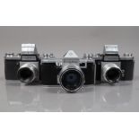 Three KW Cameras, a Praktina IIA, shutter working, body G, with Carl Zeiss Jena 50mm f/2 Flexon