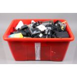 A Box of Camera Related Items. including filters, rings, grips, flash units and other items