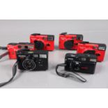 Six Konica Compact Cameras, three red Konica POP, one with ding to filter ring, shutters working,