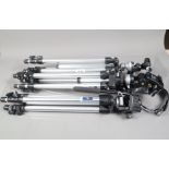 Three Aluminium Manfrotto Tripods, a Manfrotto Gruppo 055A, with 128RC pan and tilt head, a 055D,