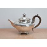 An early Victorian silver teapot by Charles Thomas Fox, squat form with engraved decoration and