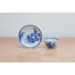 An 18th century Nanking Cargo Chinese porcelain tea bowl and saucer, with blue and white