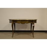 A 19th century continental stained oak ormolu decorated table, brass decoration throughout (some