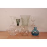 A collection of glassware, comprising a blue glass by Nina Campbell 14cm high, a green glass vase