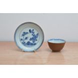 An 18th century Nanking Cargo Chinese porcelain tea bowl and saucer, with café-au-lait external