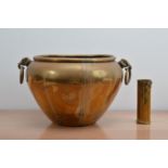 A large brass jar/planter, with two elephant drop handles (AF) 25cm H x 43cm W, together with a
