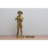 A 20th century brass sculpture of a fisherman, after Lavergne, a plaque to the front named