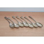 Seven George III and Victorian silver serving spoons, each monogrammed, all hallmarked, total weight