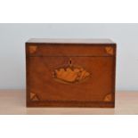 A Victorian mahogany string inlaid and marquetry tea caddy, the lid (missing some veneer) with a