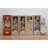 Six boxed modern porcelain dolls, comprising a Chinese example, four from the Windsor collection and