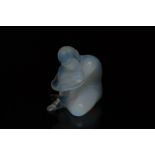 An opalescent Lalique nude Fanelli, marked to the base Lalique France, 7.5cm high