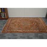 A modern middle eastern machine made rug, wool on cotton, good condition, 201cm x 133cm