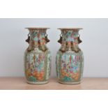 A pair of late 19th/early 20th century Chinese canton vases, famille Verte pallet, panels