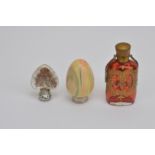 A Victorian white metal and cut glass scent bottle, in the form of a heart, screw of cap, 4cm in