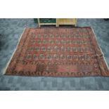 An early 20th century Turkomen Tekke woollen carpet, reinforced corners, 180cm x 146cm