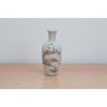 A professionally restored 19th century Chinese porcelain bottle vase, purple dragon design on a