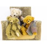 Three Artist teddy bears, including a Tyke Bear by A E Kidd dressed in blue knitted dungaree's and